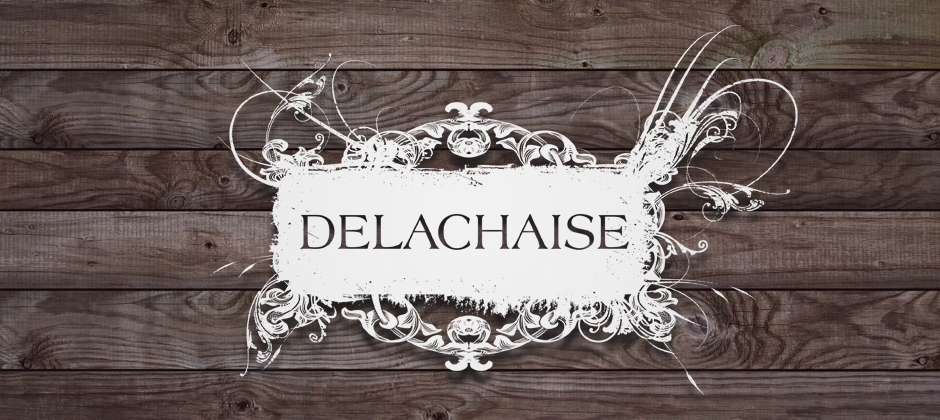 The-delachaise-wine-bar-new-orleans-white-logo-wood-background  large